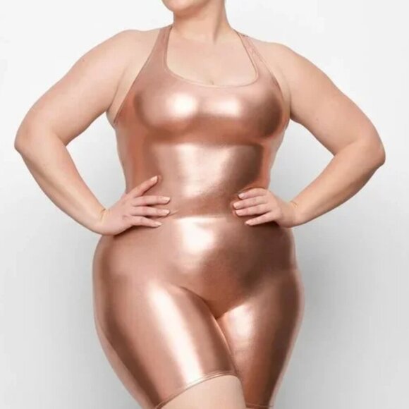 NWT SKIMS Metallic Swim Romper Cycle Suit in Champagne Rose Gold Size Medium - Picture 1 of 6